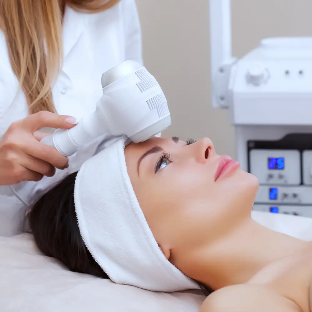 Drip IV giving patient a cryoskin facial